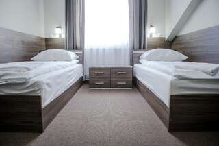 Мотели Motel Domowy Gościniec Ломжа Двухместный номер с 2 отдельными кроватями-1